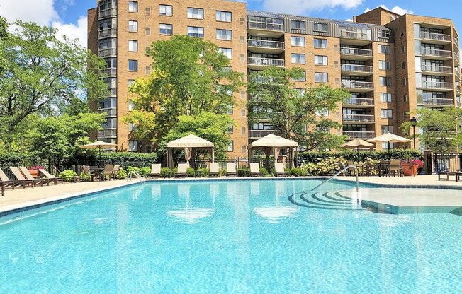 Pool with cabanas and sunshelf