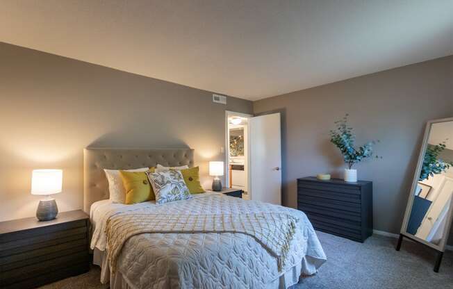 This is a photo of the primary bedroom in the 822 square foot, 2 bedroom, 1 bath floor plan at Village East Apartments in Franklin, OH.