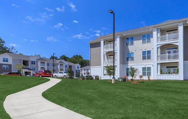 Beautiful Landscaping In Riverstone Apartments At Long Shoals in Arden, NC