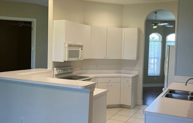 UNFURNISHED ANNUAL RENTAL IN PUNTA GORDA ISLES ON A GOLF COURSE WITH COMMUNITY POOL AND CLUBHOUSE