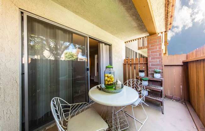 Patio with outdoor furniture and sliding glass doors into apartment