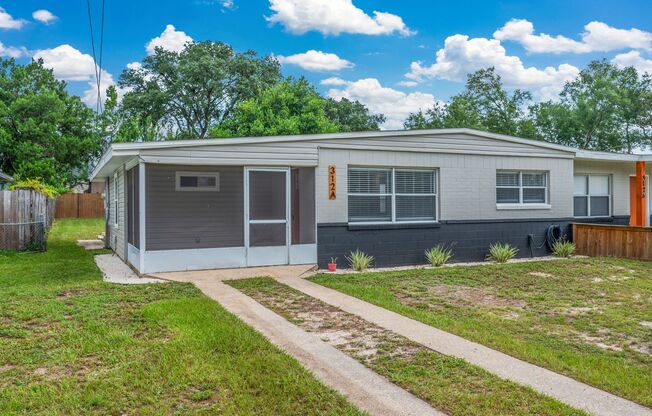 Renovated 3-Bedroom Duplex with Large Fenced Backyard