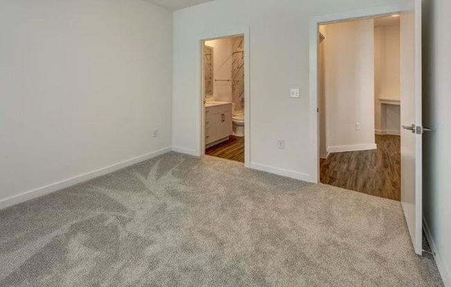 master bedroom with carpet at Brixton South Shore, Austin, Texas