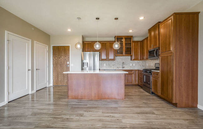 Ascend at Woodbury premium three-bedroom apartment with quartz countertops in kitchen