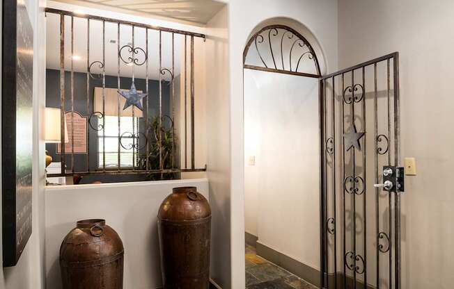 A metal gate with a star decoration on it.