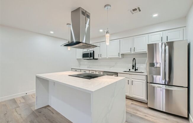 QUALITY DESIGNER Remodeled Condo in a Guard Gated Community!