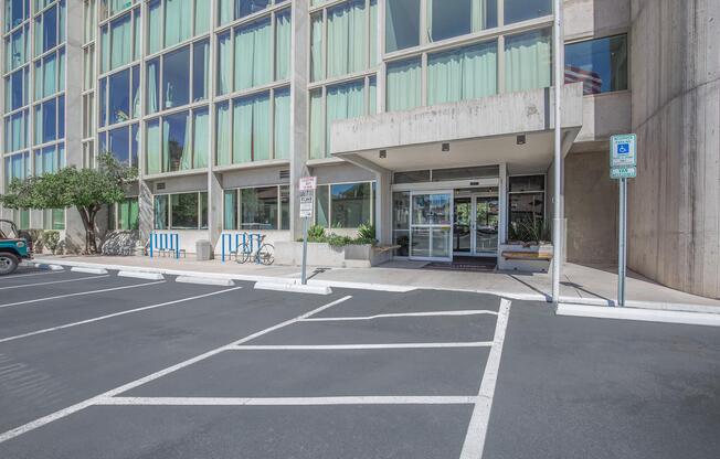 a street corner in front of a building