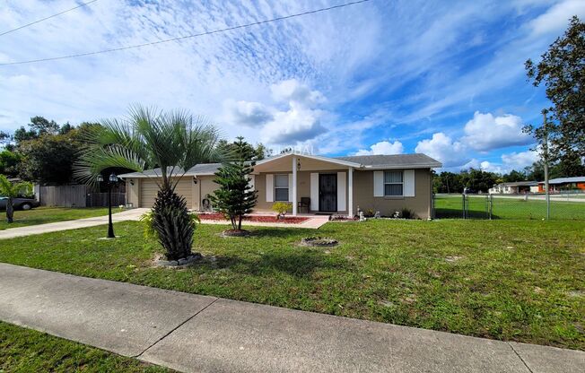 Charming 3-Bedroom Home with Spacious Backyard & 2-Car Garage.