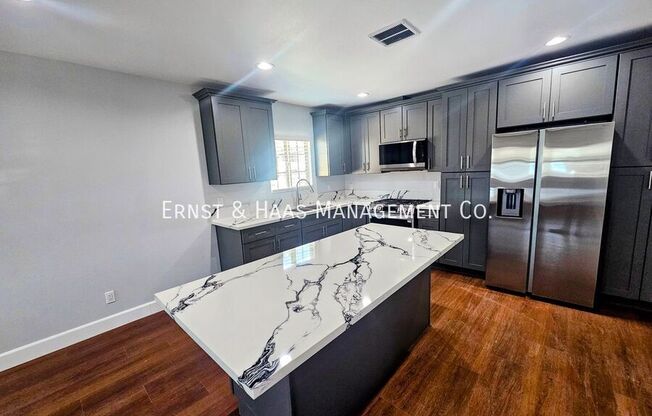 1551 W 103 ST