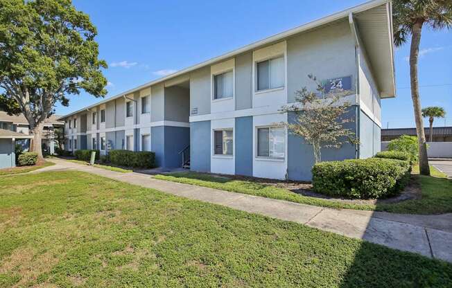 Apartment building with number 24 on the side.