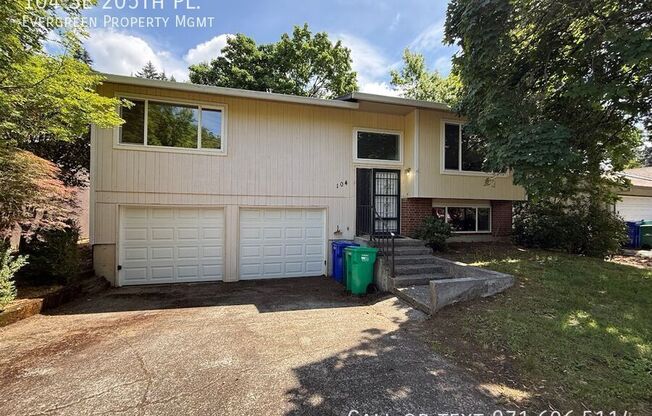 104 SE 205 PL