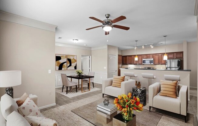 a living room with furniture and a ceiling fan