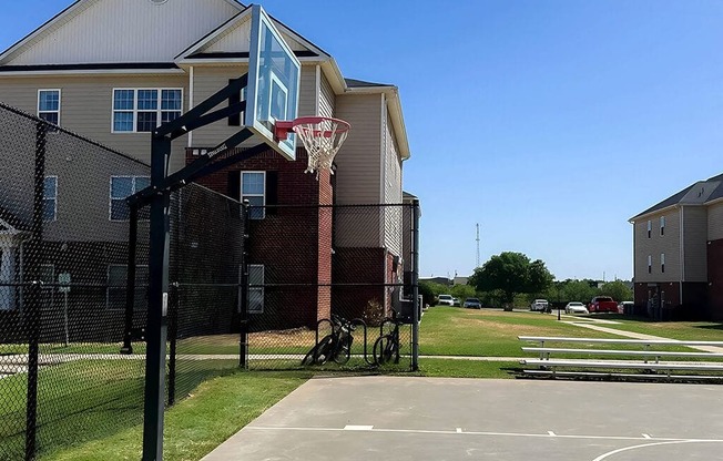 a basketball hoop in front of a house