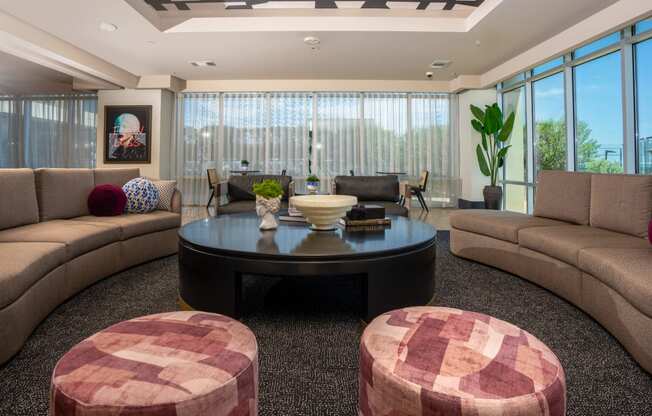 lounge seating with large floor to ceiling windows