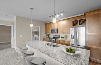 a kitchen with a granite counter top
