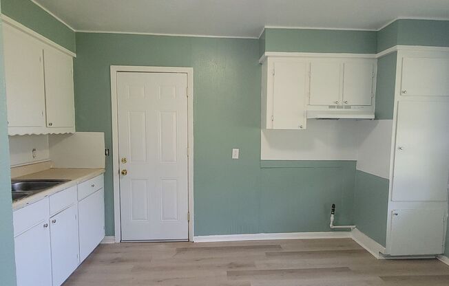 Adorable 3 bedroom/1 bath house with Central Air and Heat!