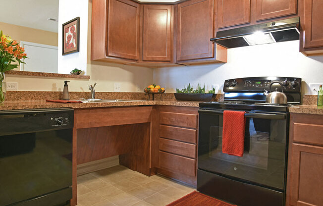Kitchen with Black Appliances at Irene Woods Apartments, Tennessee, 38017