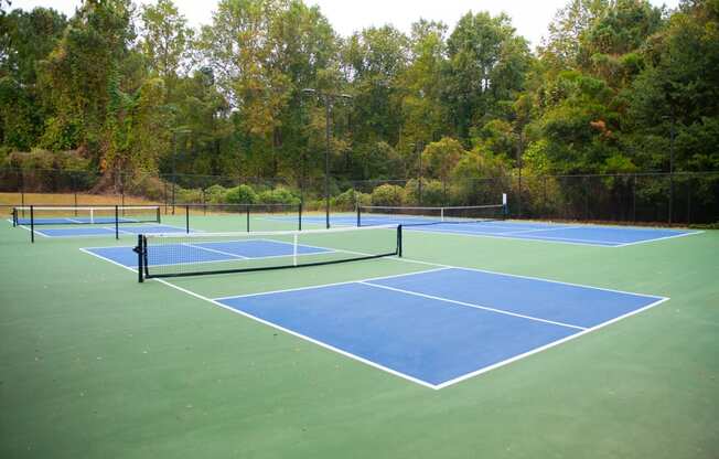 a tennis court on a green and blue court at Twenty35 at Timothy Woods, Georgia, 30606
