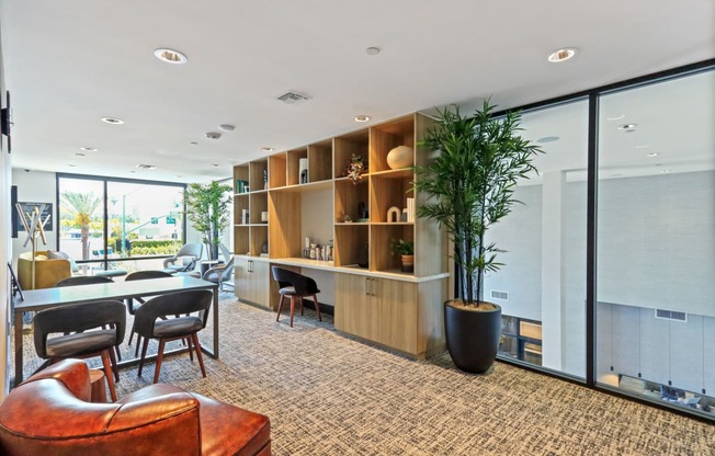 Room filled with furniture and a large window at Array La Mesa, La Mesa California