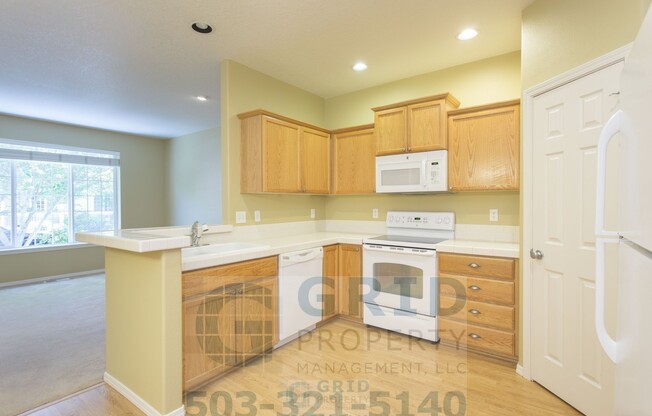 Spacious 3 Bedroom, 2.5 Bath Townhome Available in Hillsboro - 2 Car Garage!
