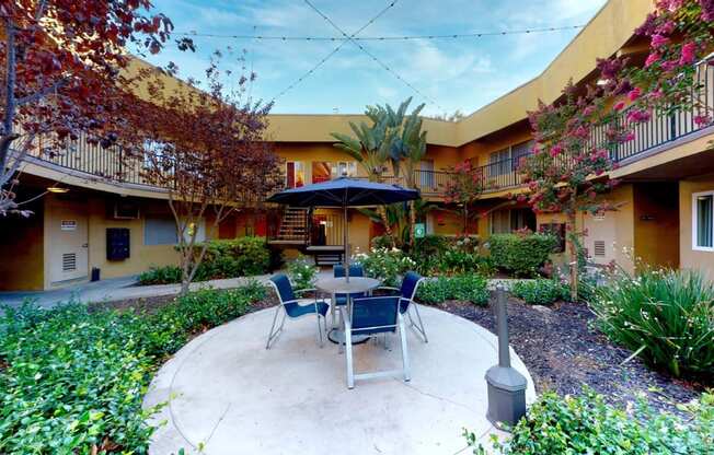 Shaded Outdoor Courtyard Area at The Marquee Apartments, California