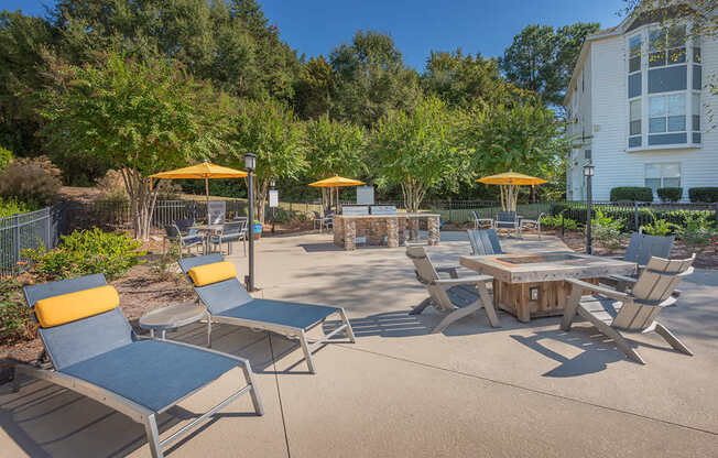 A sunny day at the outdoor seating area with blue and yellow chairs.
