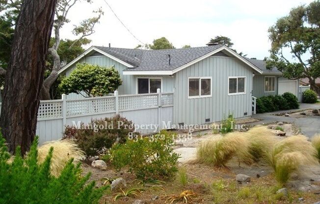 Charming 3-Bed 2-Bath Home Located In Pebble Beach Community with Fireplace and Large Back Yard