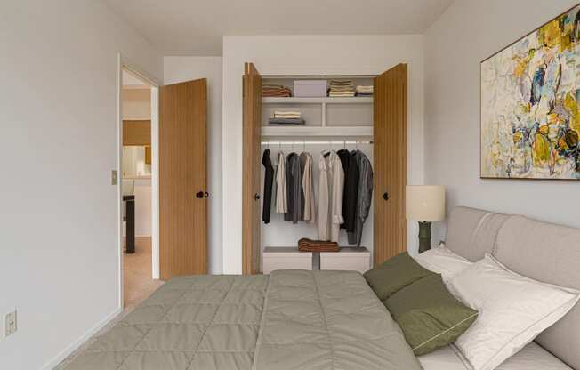 Azalea Layout Model Bedroom with Closet at Portsmouth Apartments, MI 48377