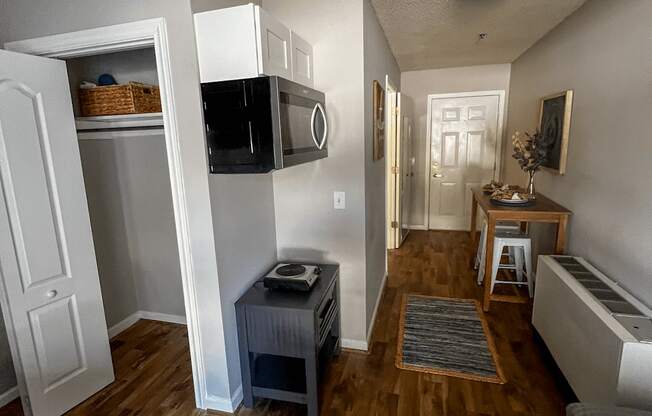an overhead view of a living room and a kitchen