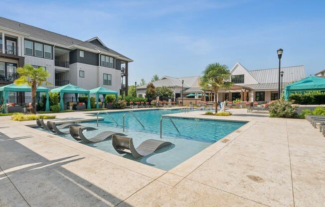 the preserve at ballantyne commons community swimming pool with apartment buildings