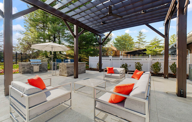 Seating area under pergola at Westwinds Apartments, Annapolis MD