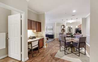 a living room and dining room at Cumberland Place Apartment Homes, Tyler, TX