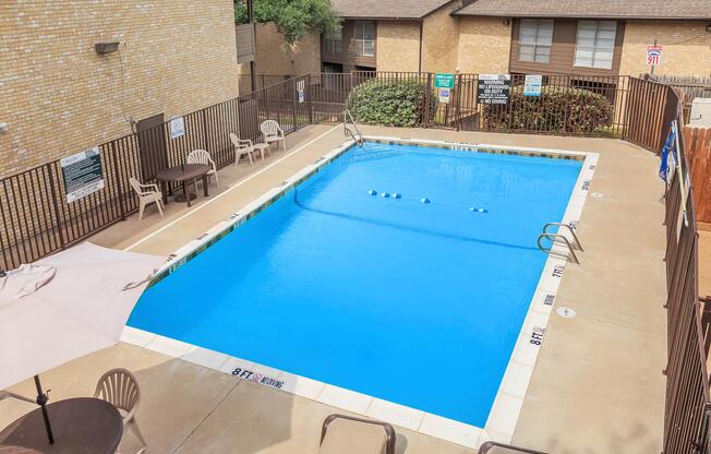 a pool next to a building