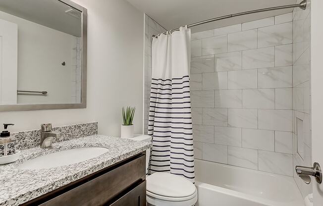 Updated bathroom at Kenilworth at Perring Park Apartments, Maryland, 21234