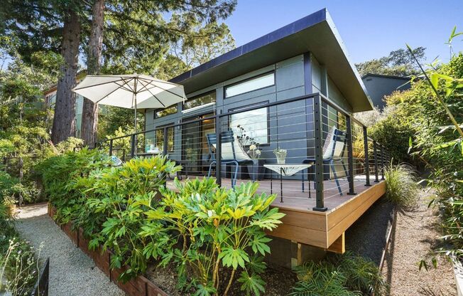 STUNNING STAND ALONE ADU STUDIO UNIT WITH TOP OF THE LINE FINISHES AND GREAT OUTDOOR SPACE