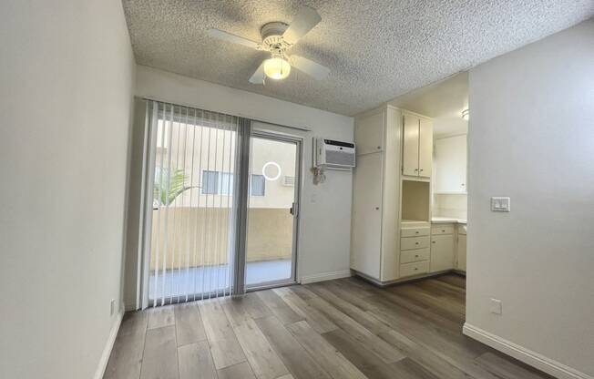 Dining Room with Hardwood Floors and Fan