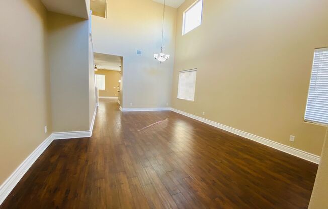 Beautiful & large Rhodes Ranch guard gated community 4 bedroom home with the master bedroom downstairs and a big loft upstairs! With a covered backyard patio. Community features pool, spa, gym, and parks!