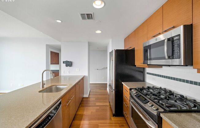 Modern 2-Bed/2-Bath Condo with Balcony, Parking & Prime Downtown Location