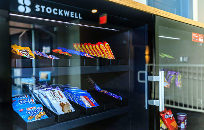 a vending machine filled with candy bars