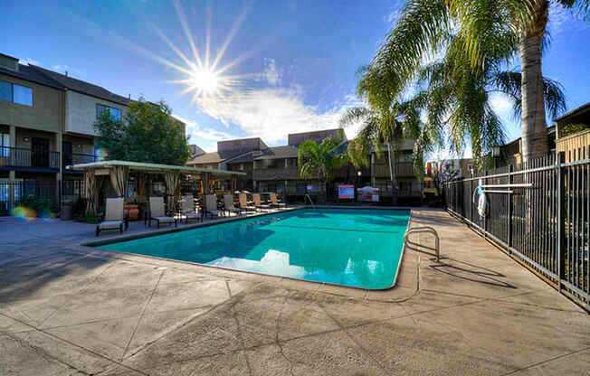 Lounging By The Pool at Highlander Park Apts, Riverside, 92507