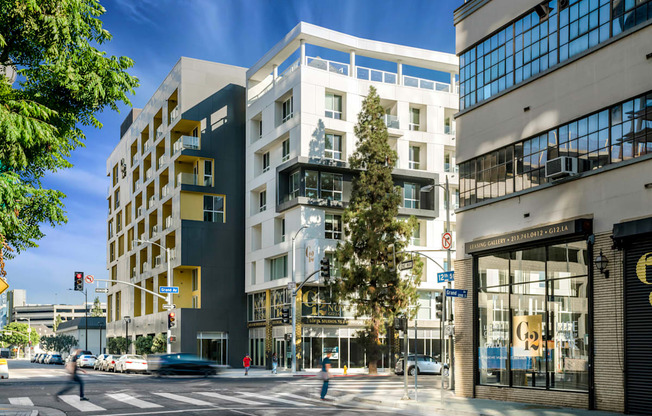 A city street with cars and buildings at G12 Apartments, Los Angeles, CA, 90015