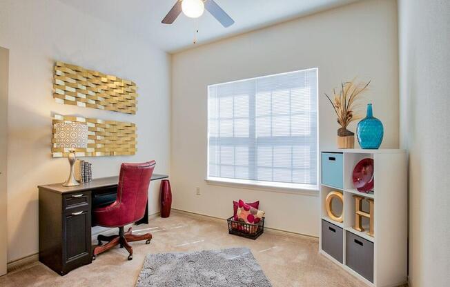 bedroom with a closet, carpet, ceiling fan, and window with blinds
