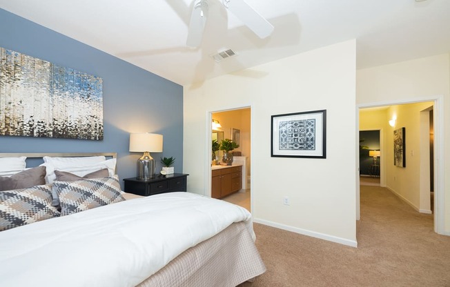 bedroom with blue accent wall