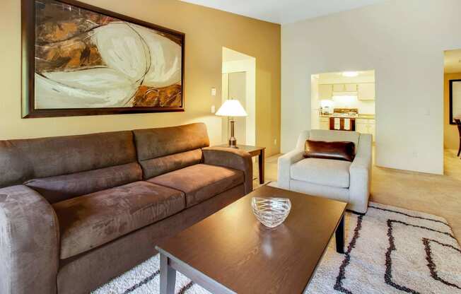 a living room with a couch and a coffee table