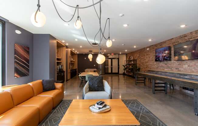 a living room filled with furniture and a flat screen tv