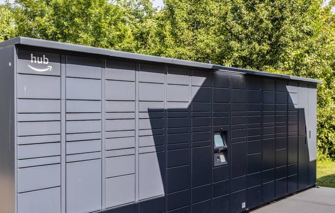 a shed with a door and a shadow on the side of it