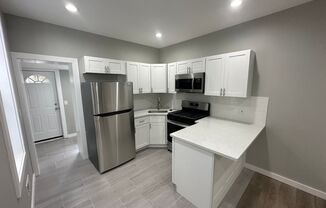 Beautifully renovated 3-bedroom, 1-bathroom home nestled in the highly sought-after West Philly area