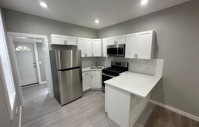 Beautifully renovated 3-bedroom, 1-bathroom home nestled in the highly sought-after West Philly area