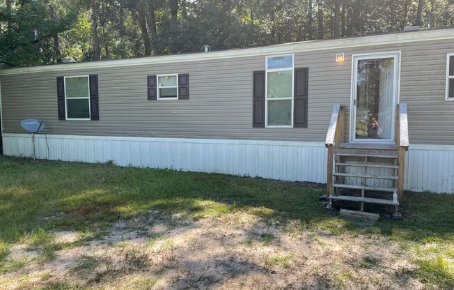 2 Bedroom, 2 Bath Single Family Home on a wooded lot