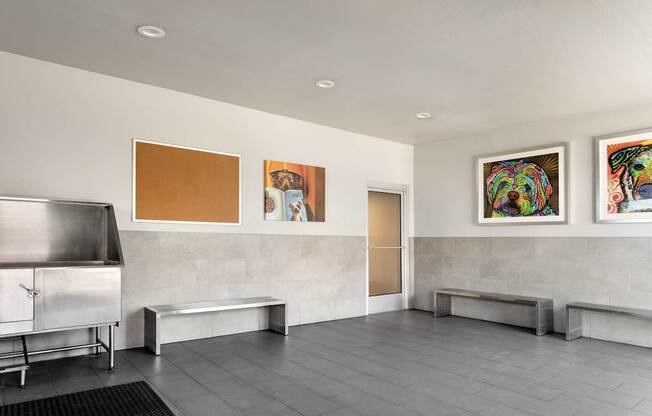 A room with a bench and a painting on the wall at Denim Scottsdale, Scottsdale, AZ